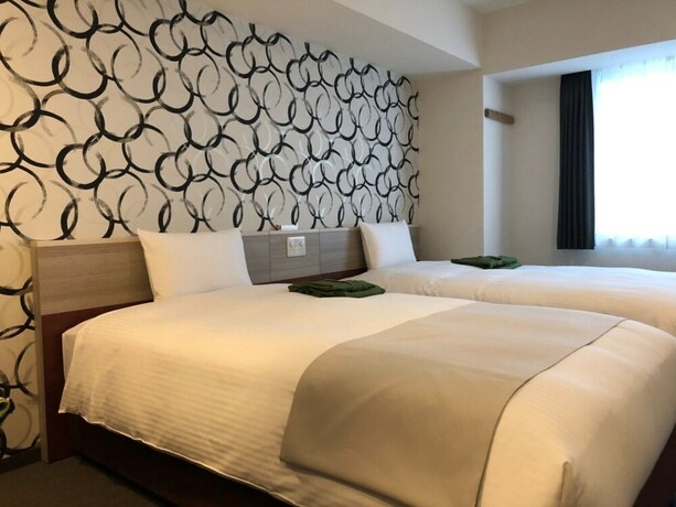 Imagen de la habitación del Hotel Kuretake Inn Premium Meieki Minami. Foto 19