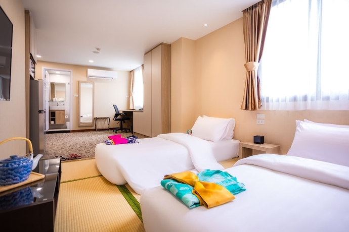 Imagen de la habitación del Hotel Kuretakeso Thailand Sriracha. Foto 2