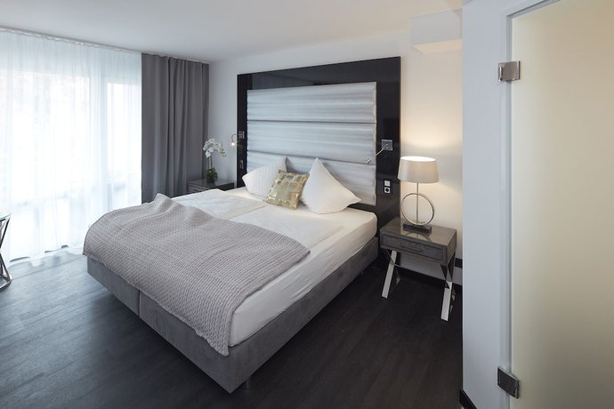 Imagen de la habitación del Hotel Kurhaus Design Boutique. Foto 9