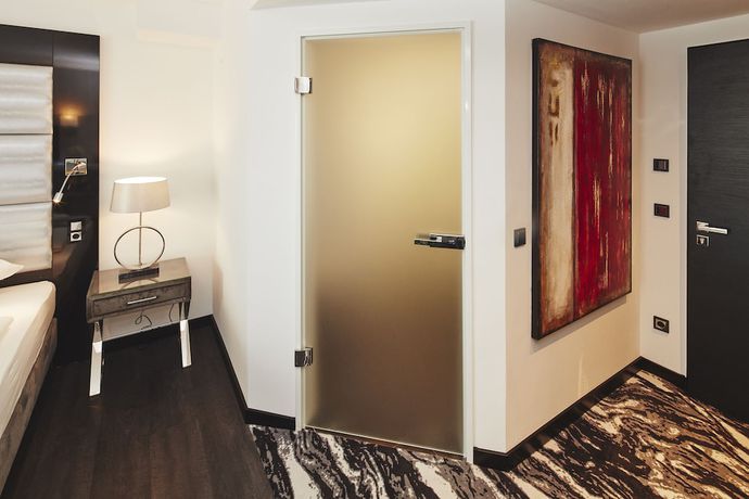 Imagen de la habitación del Hotel Kurhaus Design Boutique. Foto 17