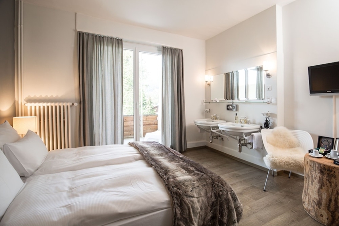 Imagen de la habitación del Hotel Kurhaus Lenzerheide. Foto 18