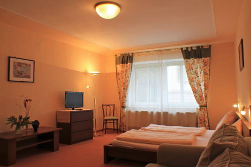 Imagen de la habitación del Hotel Kurhotel Quellenhof. Foto 8