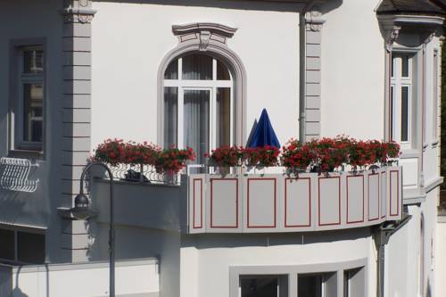 Imagen de la habitación del Hotel Kurhotel Quellenhof. Foto 10