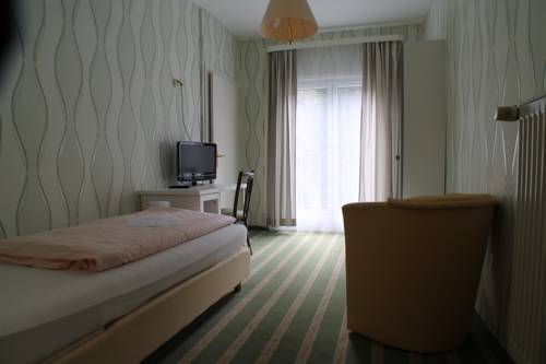 Imagen de la habitación del Hotel Kurhotel Quellenhof. Foto 12