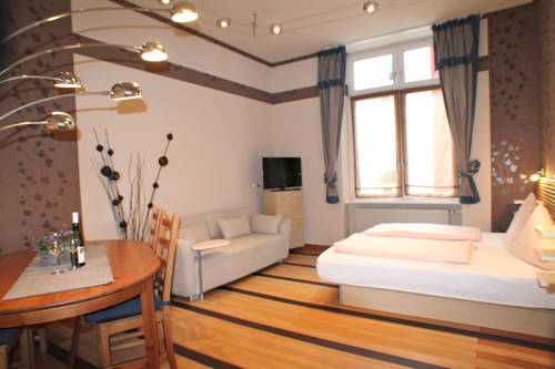 Imagen de la habitación del Hotel Kurhotel Quellenhof. Foto 15