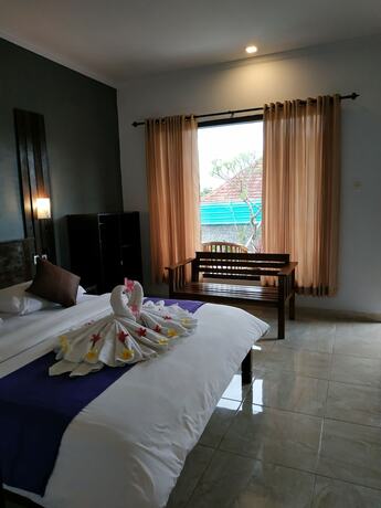Imagen de la habitación del Hotel Kuri Garden Cottage. Foto 26