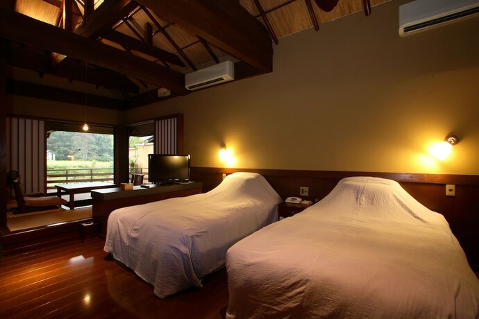 Imagen de la habitación del Hotel Kurokawa Onsen Satonoyu Waraku. Foto 32