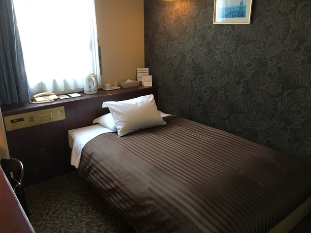 Imagen de la habitación del Hotel Kurume Station. Foto 9