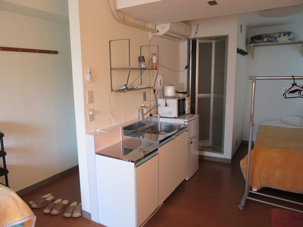 Imagen de la habitación del Hotel Kurumi Weekly Mansion. Foto 3