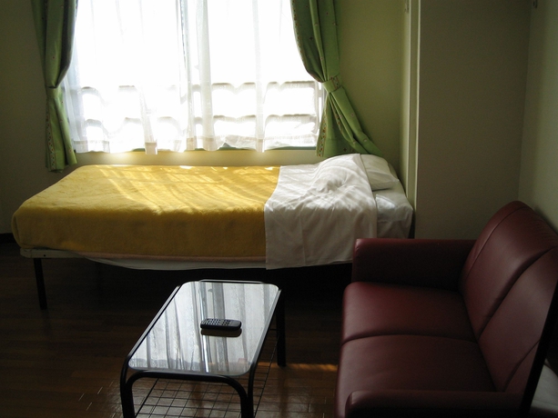 Imagen de la habitación del Hotel Kurumi Weekly Mansion. Foto 4