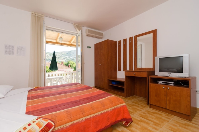 Imagen de la habitación del Hotel Kusalo Apartments. Foto 2