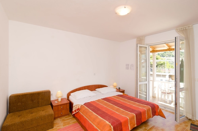 Imagen de la habitación del Hotel Kusalo Apartments. Foto 3