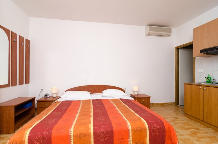 Imagen de la habitación del Hotel Kusalo Apartments. Foto 4