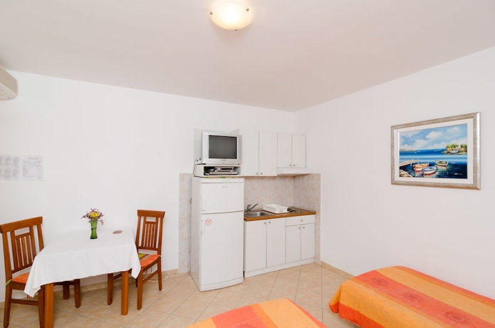 Imagen de la habitación del Hotel Kusalo Apartments. Foto 6