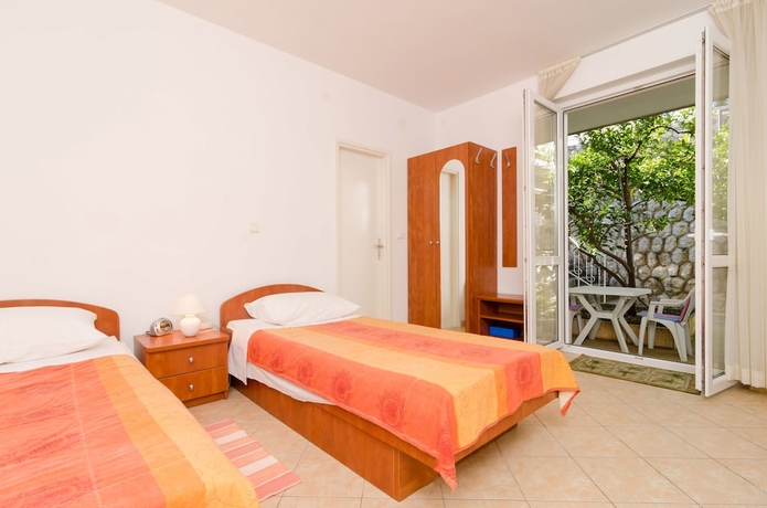 Imagen de la habitación del Hotel Kusalo Apartments. Foto 7