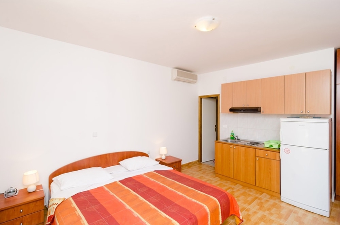 Imagen de la habitación del Hotel Kusalo Apartments. Foto 8