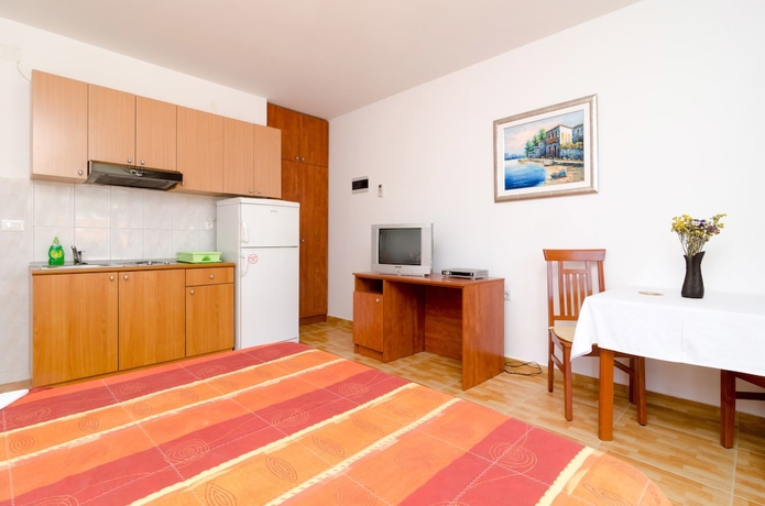 Imagen de la habitación del Hotel Kusalo Apartments. Foto 10