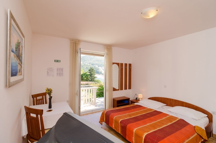 Imagen de la habitación del Hotel Kusalo Apartments. Foto 12