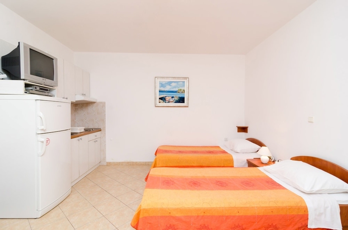 Imagen de la habitación del Hotel Kusalo Apartments. Foto 15