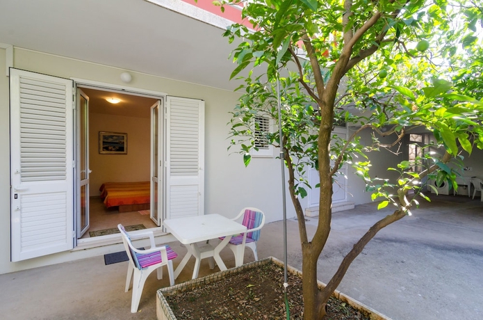 Imagen de la habitación del Hotel Kusalo Apartments. Foto 17