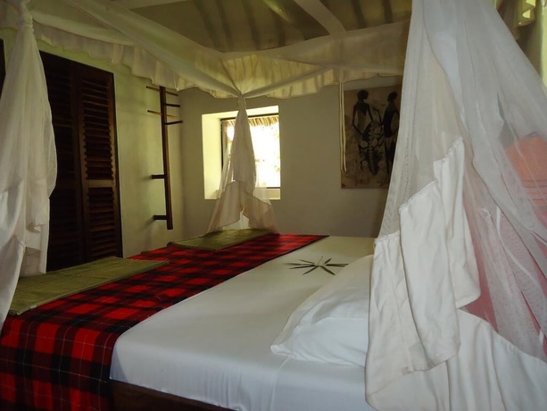 Imagen de la habitación del Hotel Kusini Beach Cottages. Foto 5