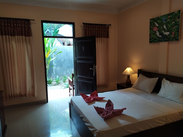 Imagen de la habitación del Hotel Kusuka Bungalows. Foto 4