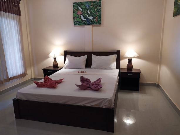 Imagen de la habitación del Hotel Kusuka Bungalows. Foto 8