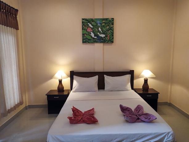 Imagen de la habitación del Hotel Kusuka Bungalows. Foto 10