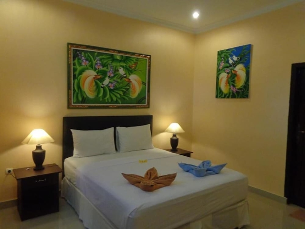 Imagen de la habitación del Hotel Kusuka Bungalows. Foto 11
