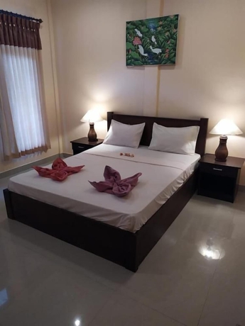 Imagen de la habitación del Hotel Kusuka Bungalows. Foto 12