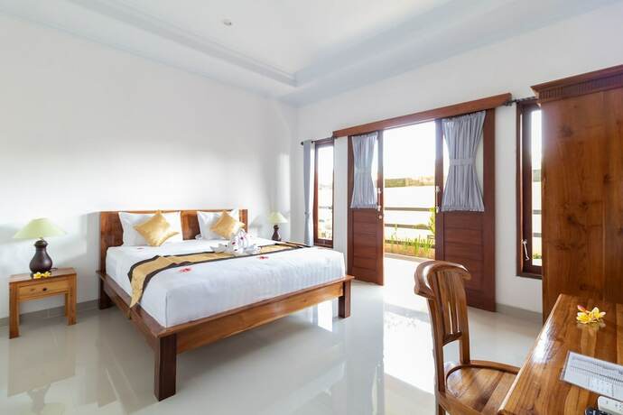 Imagen de la habitación del Hotel Kusuma Guesthouse. Foto 17