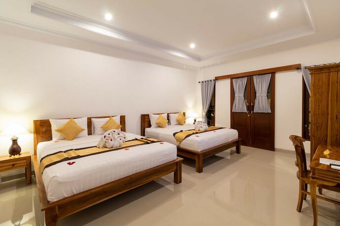 Imagen de la habitación del Hotel Kusuma Guesthouse. Foto 18