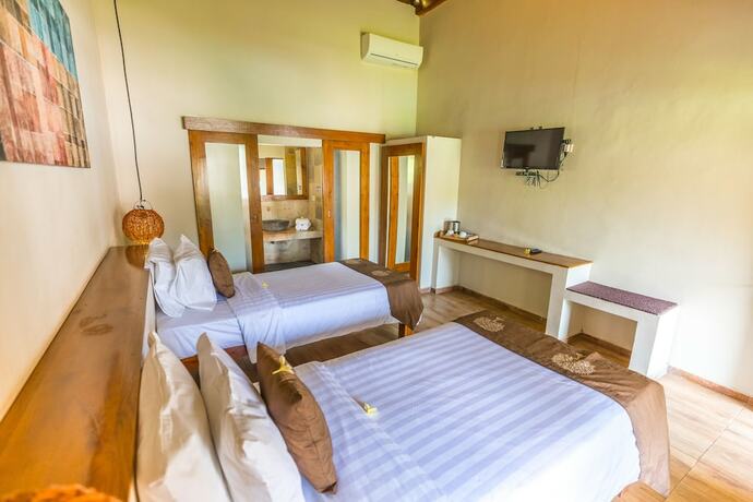 Imagen de la habitación del Hotel Kuta Baru. Foto 14