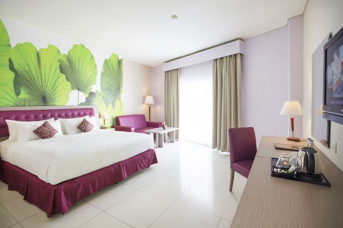 Imagen de la habitación del Hotel Kuta Central Park. Foto 9