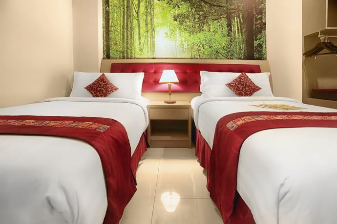 Imagen de la habitación del Hotel Kuta Central Park. Foto 10