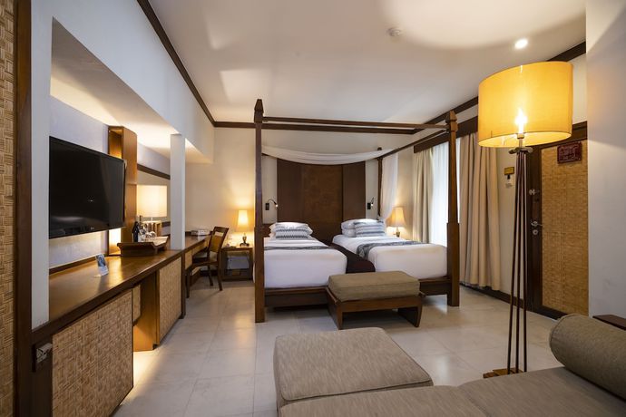 Imagen de la habitación del Hotel Kuta Seaview Beach Resort. Foto 11