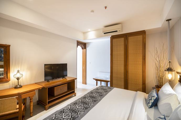 Imagen de la habitación del Hotel Kuta Seaview Beach Resort. Foto 14
