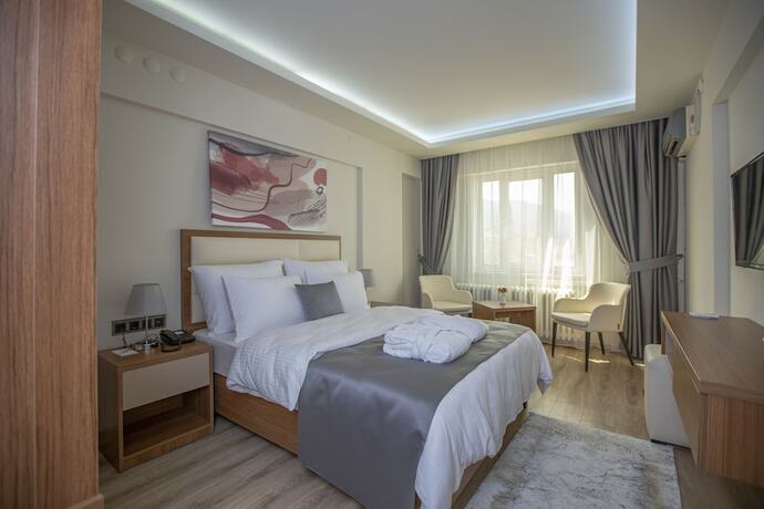 Imagen de la habitación del Hotel Kutlucan Oldtown. Foto 17
