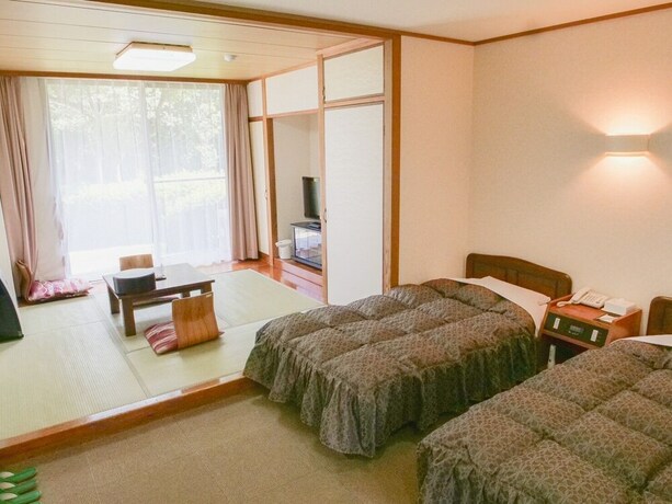 Imagen de la habitación del Hotel Kutsuroginomori Greenpia Yame. Foto 16