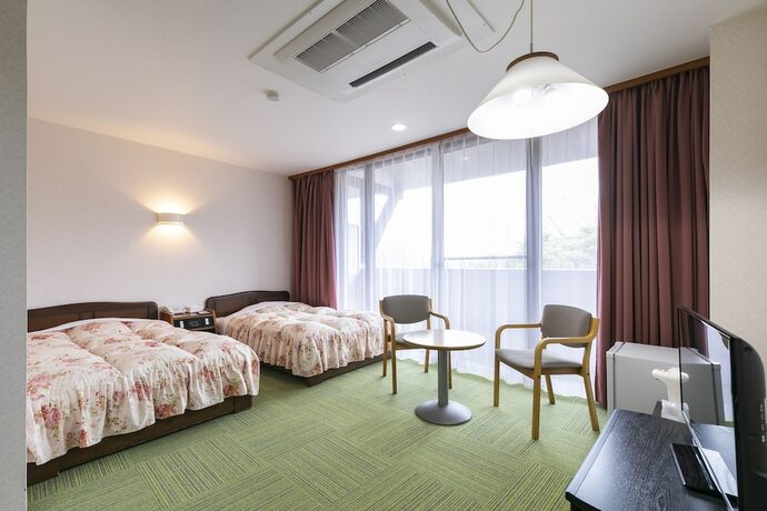 Imagen de la habitación del Hotel Kutsuroginomori Greenpia Yame. Foto 17