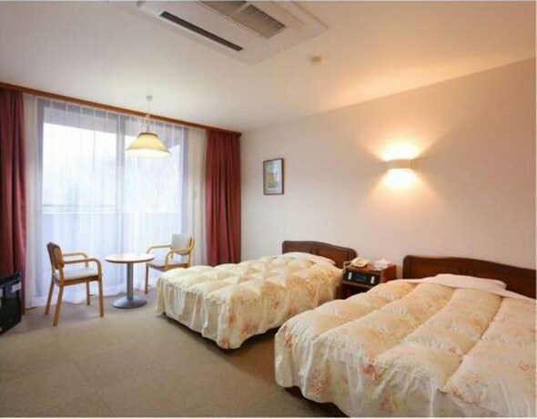 Imagen de la habitación del Hotel Kutsuroginomori Greenpia Yame. Foto 22