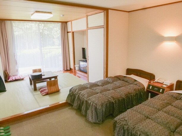 Imagen de la habitación del Hotel Kutsuroginomori Greenpia Yame. Foto 23