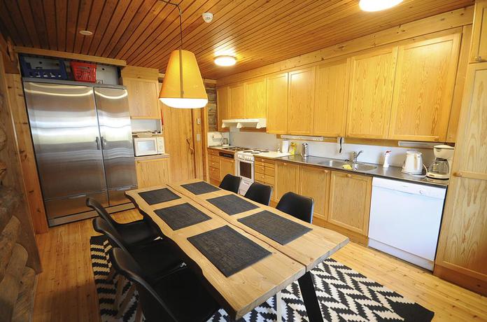 Imagen de los interiores del Hotel Kuukkeli Log Houses Aurora Resort. Foto 12