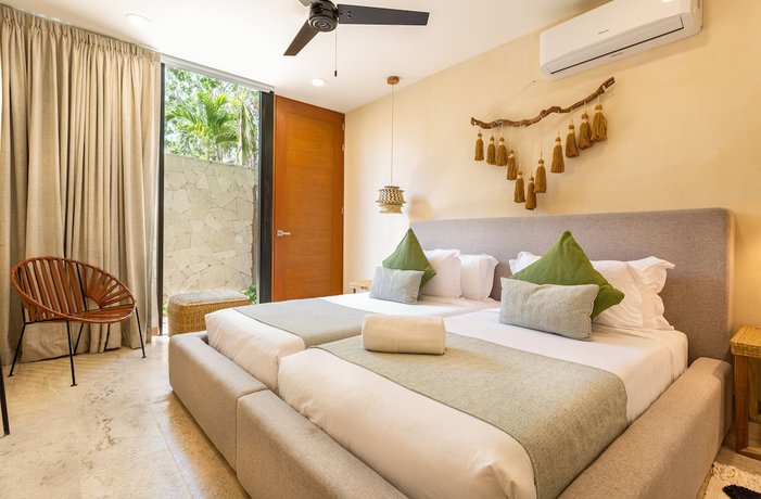 Imagen de la habitación del Hotel Kuukum Tulum. Foto 4