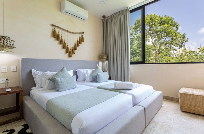 Imagen de la habitación del Hotel Kuukum Tulum. Foto 7
