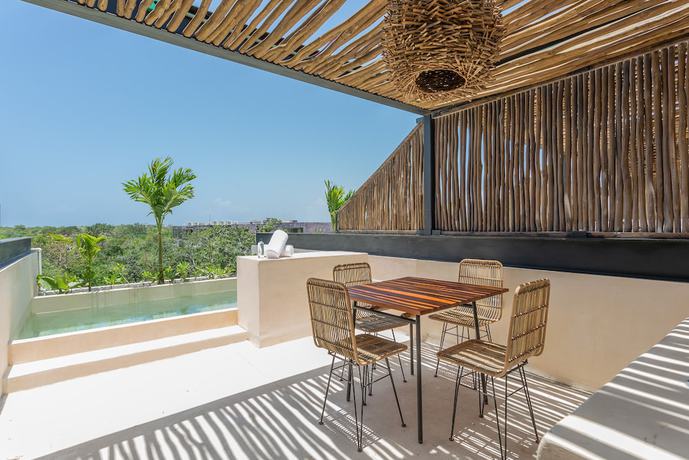 Imagen de la habitación del Hotel Kuukum Tulum. Foto 9