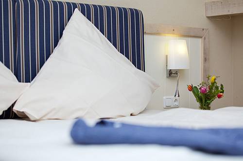 Imagen de la habitación del Hotel K&uuml;stenklang. Foto 8