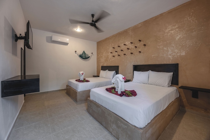 Imagen de la habitación del Hotel Kuxtal. Foto 5
