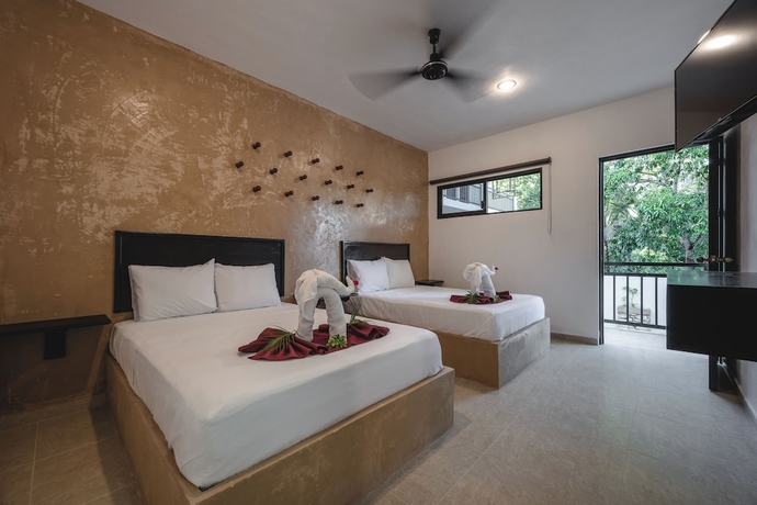 Imagen de la habitación del Hotel Kuxtal. Foto 6