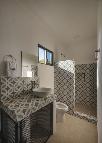Imagen de la habitación del Hotel Kuxtal. Foto 15